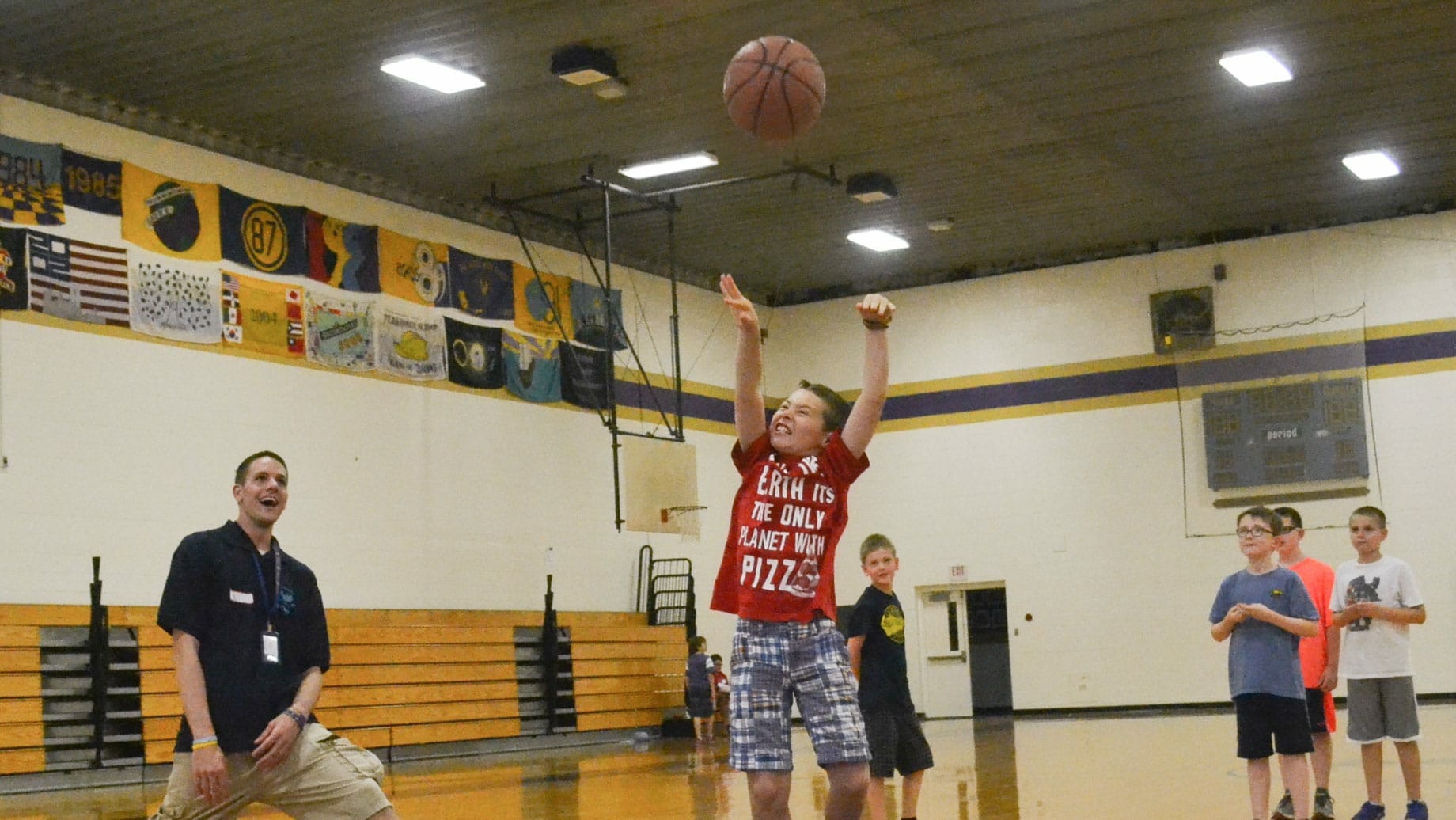 Camper shooting a basketball