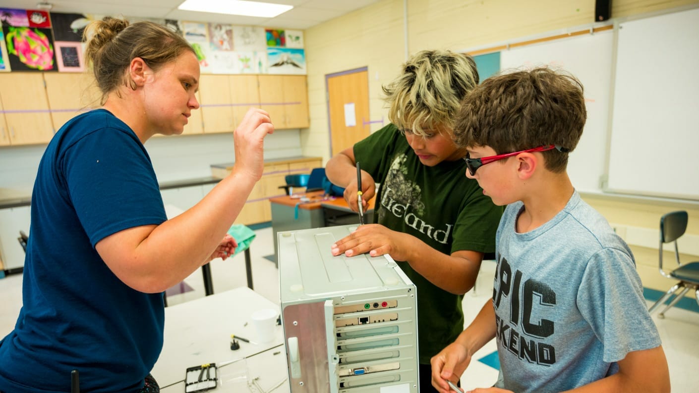 Boys learning how computers work