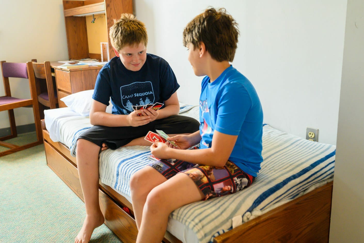 Boys playing games in dorm
