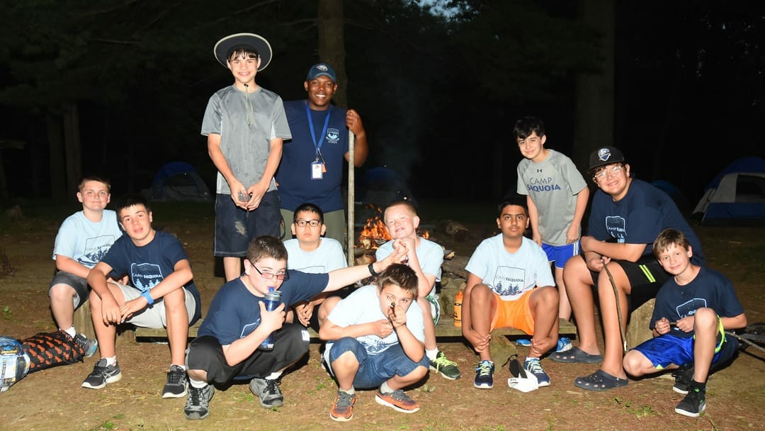 Campers with staff on an overnight retreat