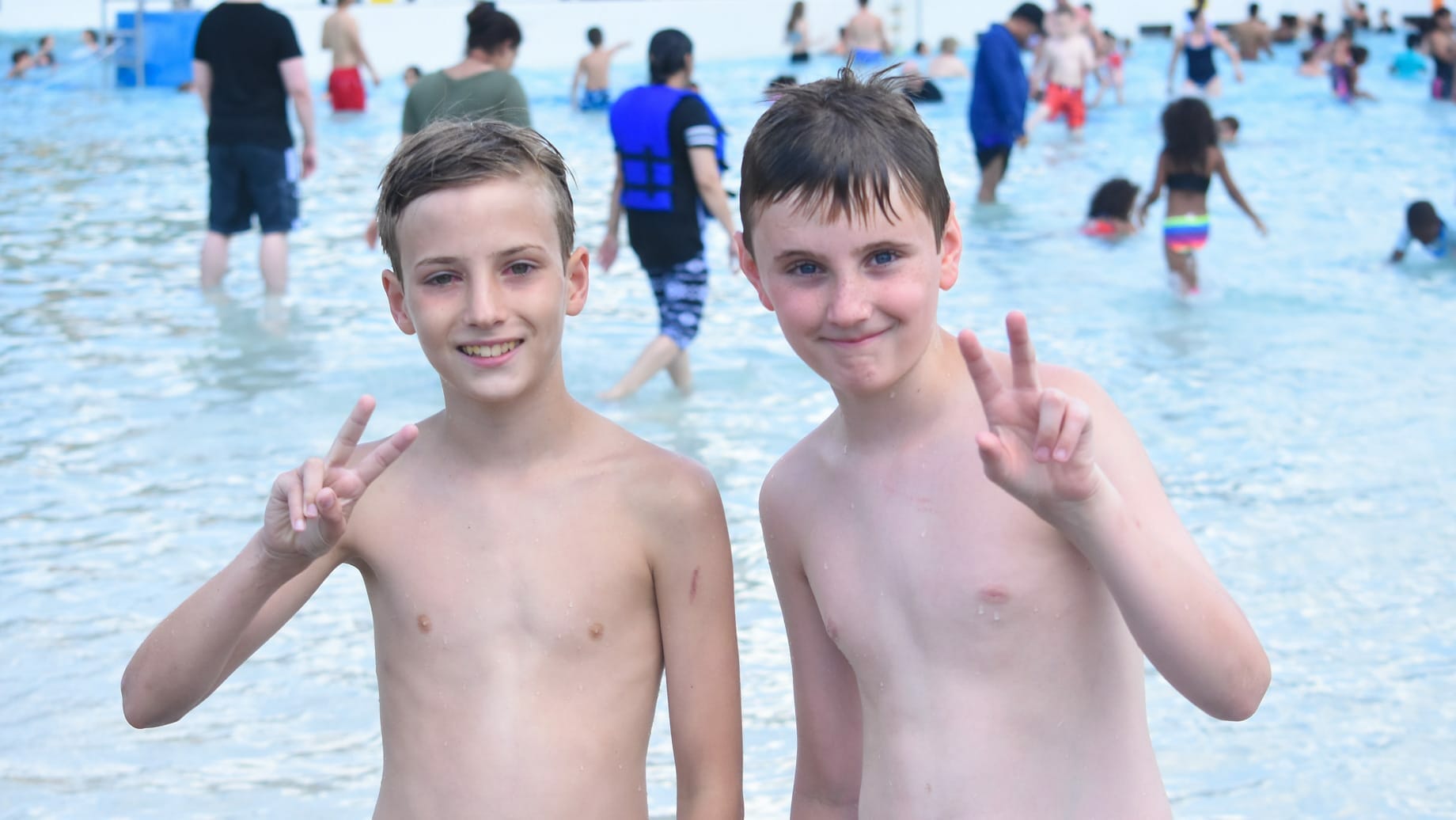 Campers at a waterpark smiling