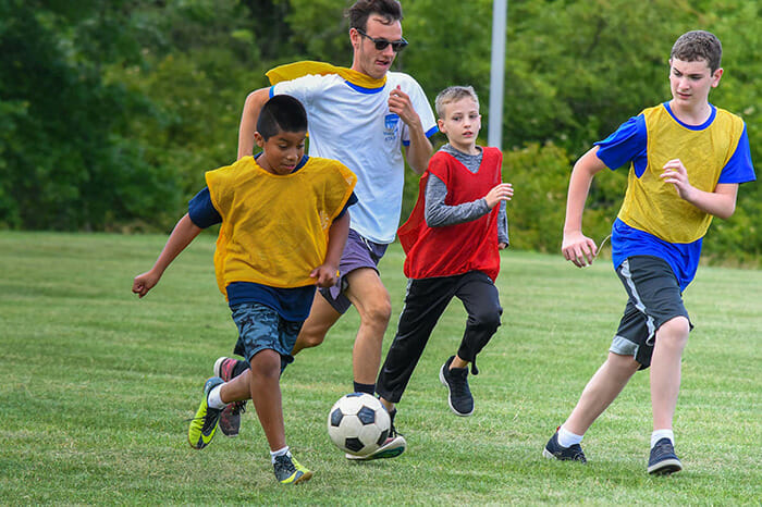 Campers playing soccer